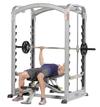 An image of a guy doing weights on the Hoist MiSmith